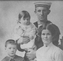 Farquhar with oldest son and youngest daughter along with his wife.  Photo was taken while he was a submariner during the first world war